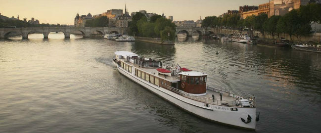 Luxury yachts navigating the seine river